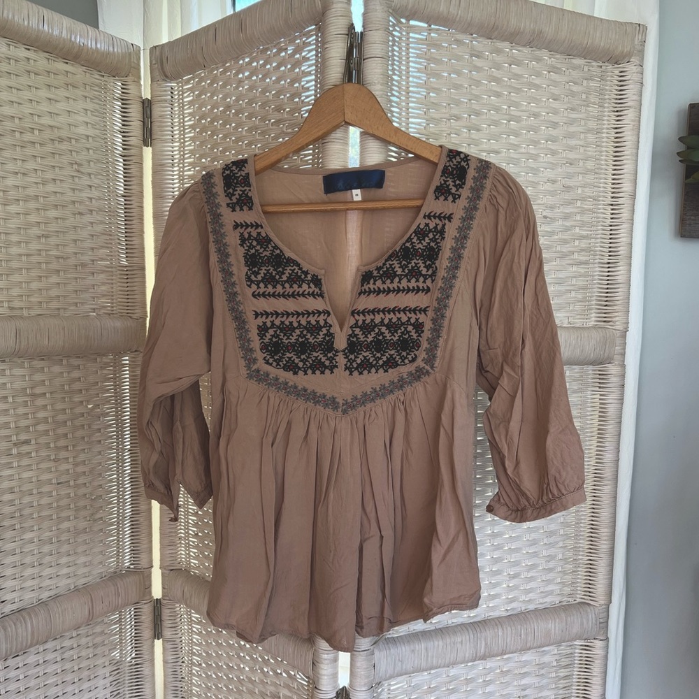 Embroidered peplum top